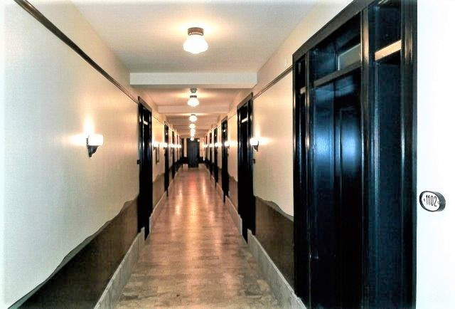 After: view of residential corridor after rehabilitation